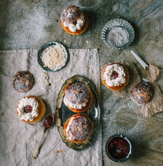Homemade buns with jam and cream