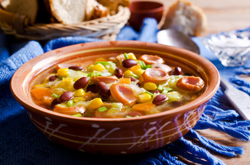 Soup with vegetables and sausages