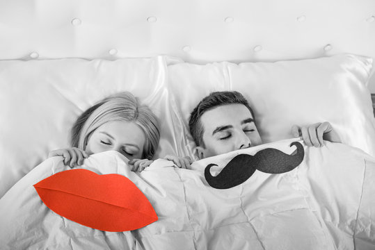 couple in bed sleeping