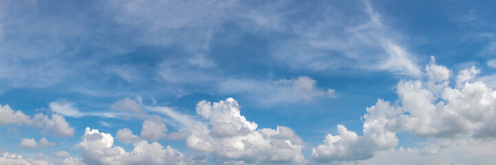 Naklejka na ściany i meble Vibrant color panoramic sky with cloud on a sunny day.