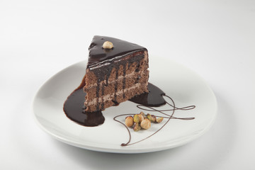 Chocolate cake Covered with chocolate sauce and hazelnut