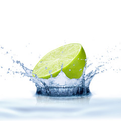 Fototapeta na wymiar Fresh Lime Fruit With Water Splash