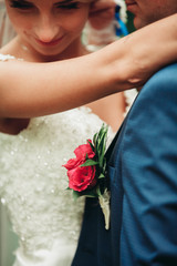 beautiful wedding couple in park. kiss and hug each other