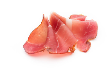 Slices of ham on white background.