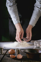 Knead the dough by female hands