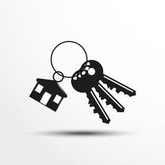 Keys with a decorative trinket. Vector illustration.