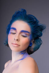 Woman face with blue make up art