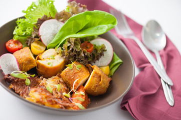Chicken breast wrapped with salad