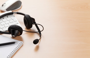 Obraz na płótnie Canvas Office desk with headset. Call center