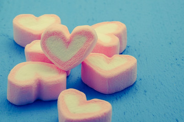 Fototapeta premium Pink heart shape of marshmallow with filter effect retro vintage