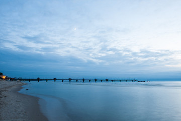 Fototapeta premium Pier in Miedzyzdroje in Poland - Sunset