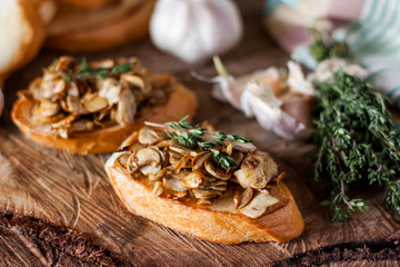 fried mushrooms with toast - obrazy, fototapety, plakaty