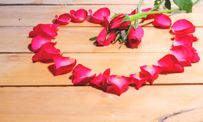 Petals of roses on the table.