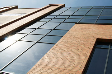 The glass facade of the building