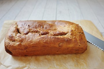 Vegan banana bread with a knife
