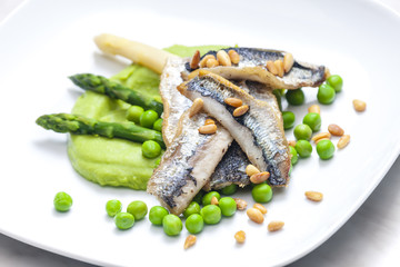 herring with green asparagus and peas