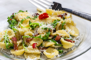 pasta orecchiette with ruccola and bacon