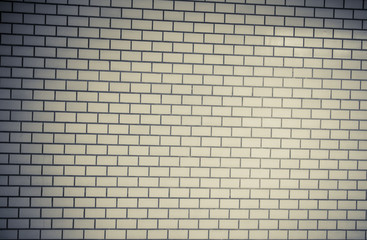 Fototapeta na wymiar Block wall pattern in vintage style with under exposure