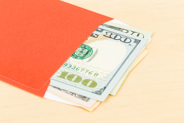 Money dollar in red envelope