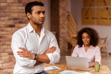 Attractive Afro-American couple working