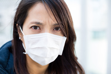 Woman wearing face mask for protection