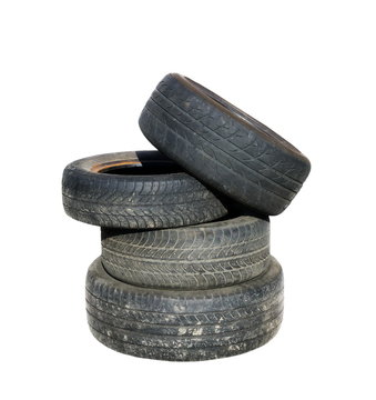 Old tires stacked, isolated on white background