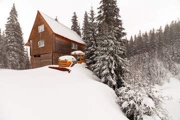 Frozen dozer in high mountains