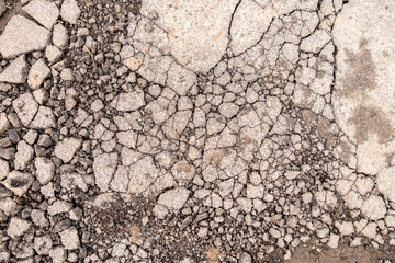Detailed macro cracked tarmac, road surface.