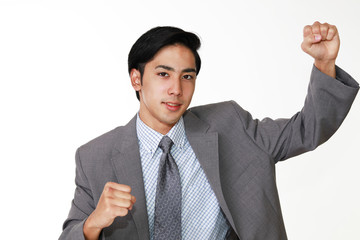 ガッツポーズのビジネスマン