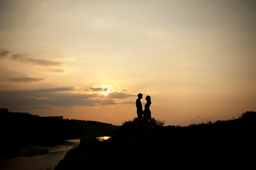 Fototapeta premium Couple lover holiday happy silhouette sky sunset