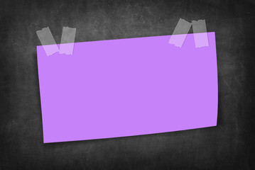 blank large purple sticky note on a chalkboard