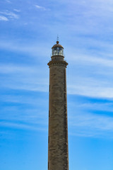 Fototapeta na wymiar Lighthouse in Maspalomas (Faro de Maspalomas) on Grand Canary (Gran Canaria), the biggest lighthouse in the Canary Islands, Spain
