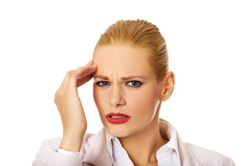 Obraz premium Business woman wtih huge head ache