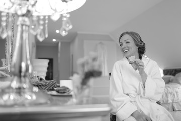 Young bride having quick snack while getting ready.