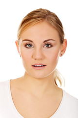 Obraz premium Young shocked woman with open mouth