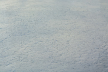 Thick layer of clouds seen from a plane