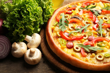 Delicious pizza with vegetables, close-up