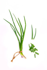 Branch of fresh spring onions and spring onions chops for season