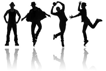 Silhouettes of dancers in dancing concept