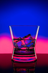 hot drink shots in bar on color abstract background