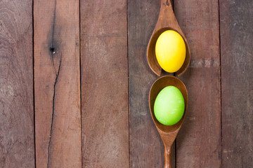 Easter eggs  on a Wooden kitchenware.and wood background