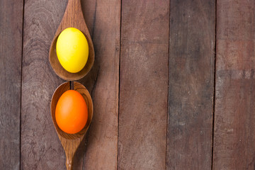 Easter eggs  on a Wooden kitchenware.and wood background