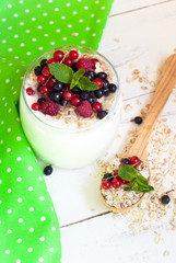 yogurt with berries and oat flakes