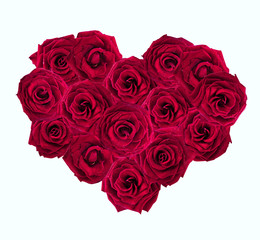 Valentines Day heart made of red roses isolated on white