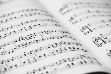 Closeup of Sheet Music. Musical Notes with Selective Focus.