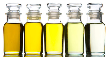 Avocado fruit oil, sesame seed oil, olive oil, grape seed oil and corn oil in vial glass bottle...