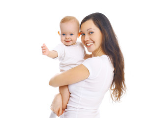 Happy smiling mother hugging baby on white background