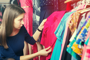 Clothes hanging on the rack in the store