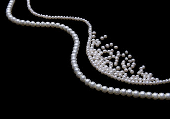beautiful pearls on black background