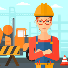 Friendly builder with arms crossed.